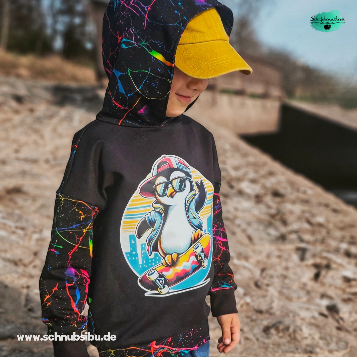 Bügelbild Pinguin auf Skateboard